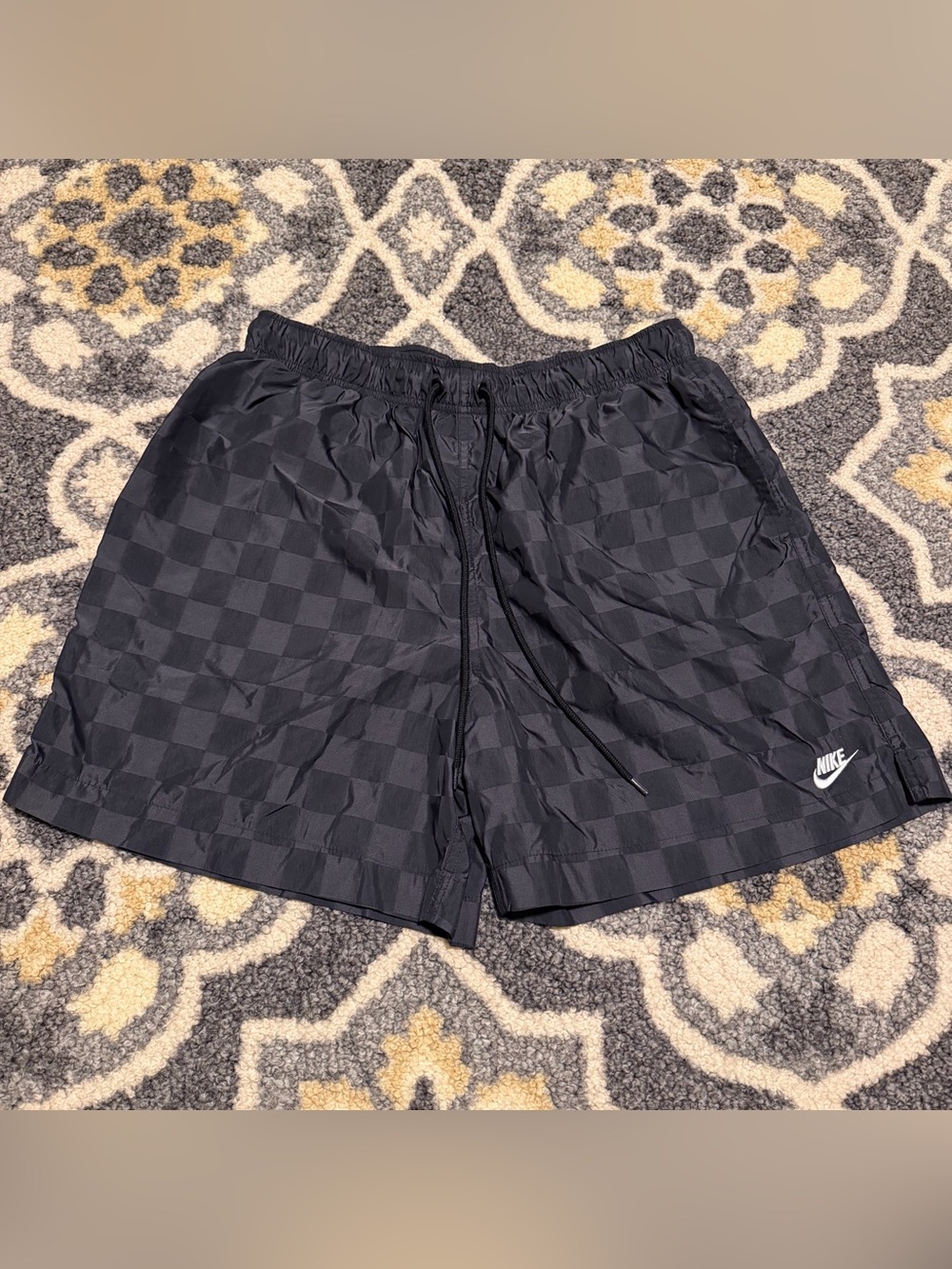 NIKE Men’s Black Checkered Athletic Shorts with White Swoosh Logo | Size L